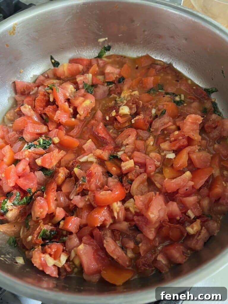 Pan of sauteed tomatoes.