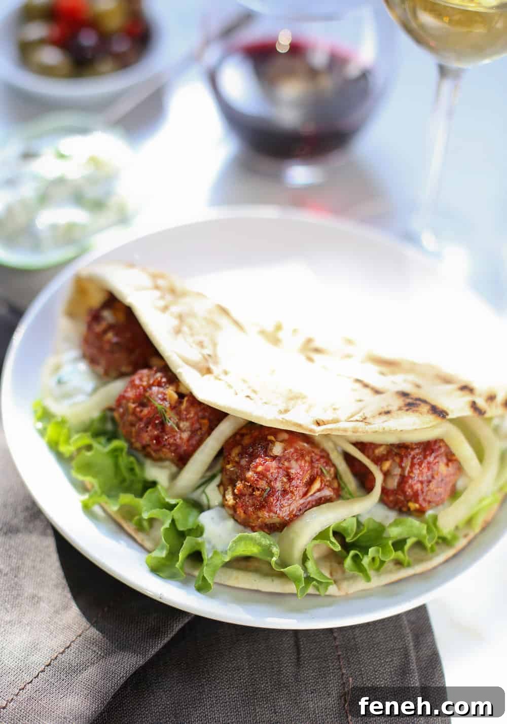 Smoked Lamb Meatball Pita Sandwiches. 