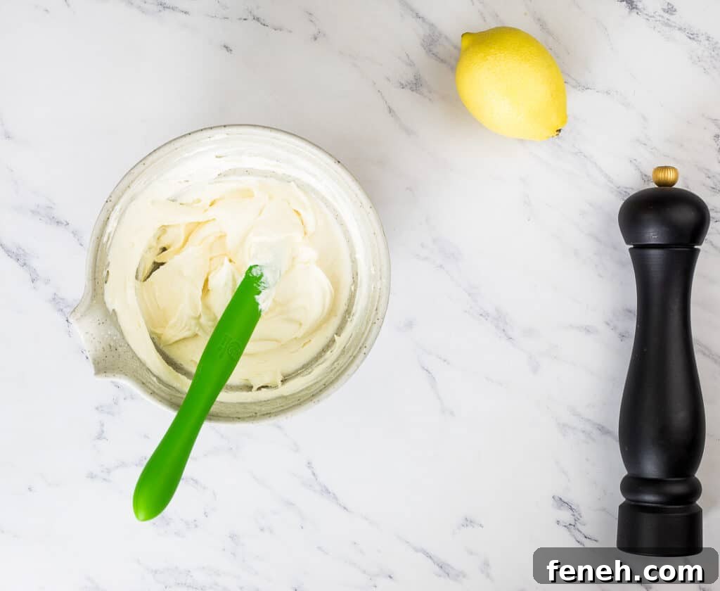 Mixed mascarpone cheese in a bowl.