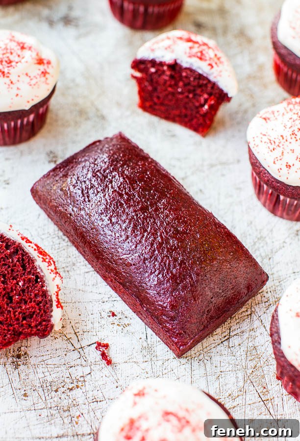 Red Velvet Cupcakes with Vanilla Cream Cheese Frosting Red Velvet Cupcakes with Cream Cheese Frosting and an unfrosted red velvet loaf cake.
