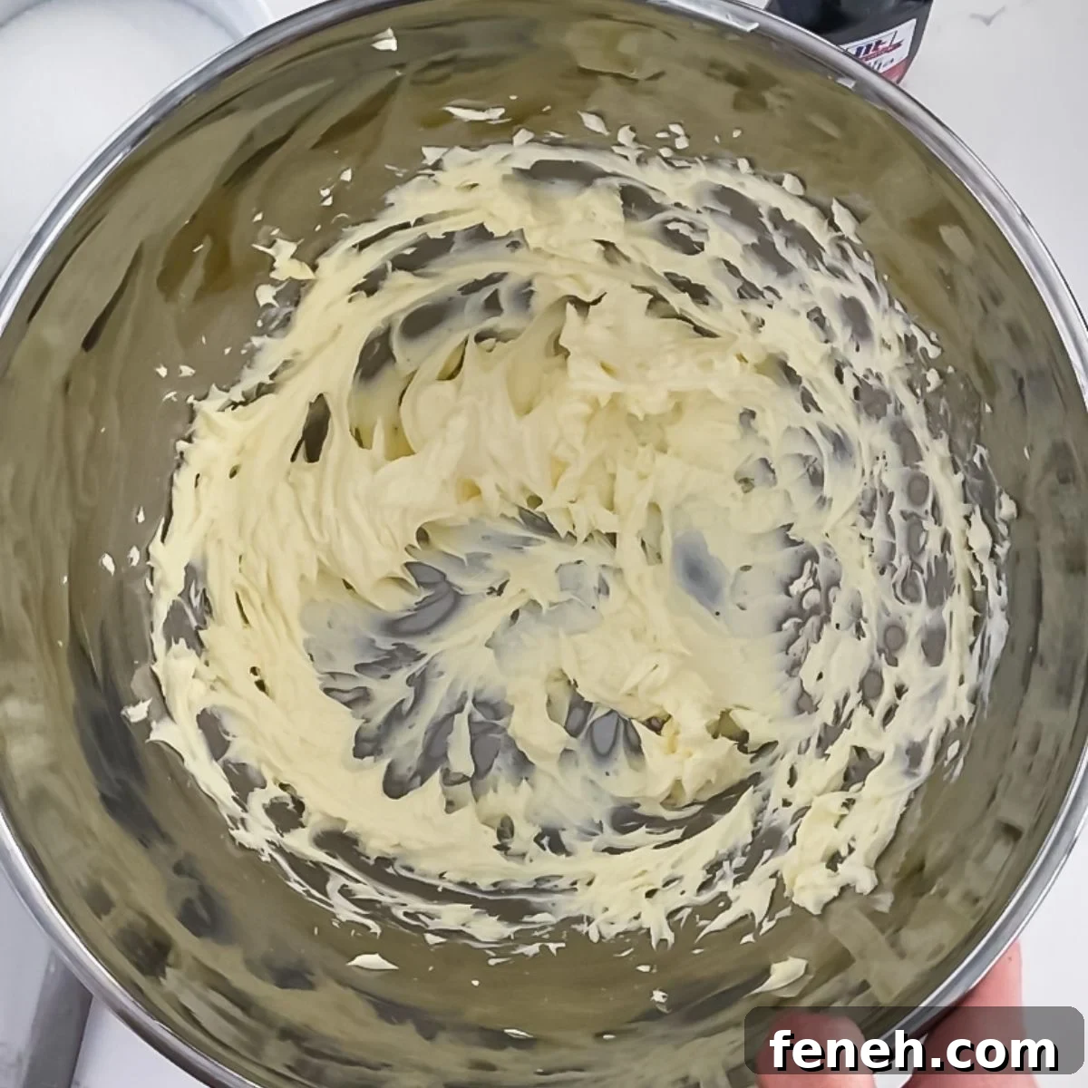 whipped butter and cream cheese in a bowl.