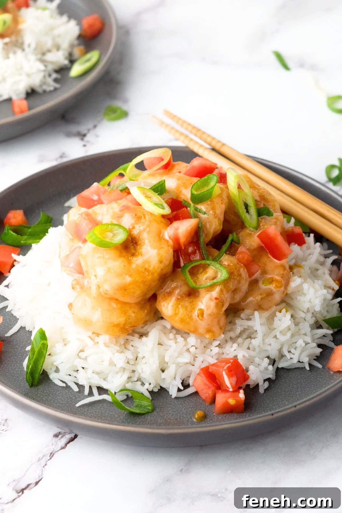 A plate of bang bang shrimp and rice