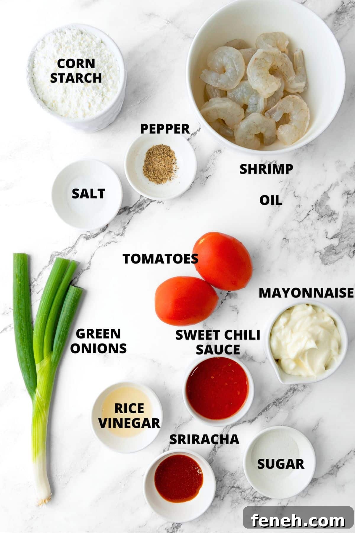 Ingredients for gluten-free fried shrimp recipe laid out on marble board.