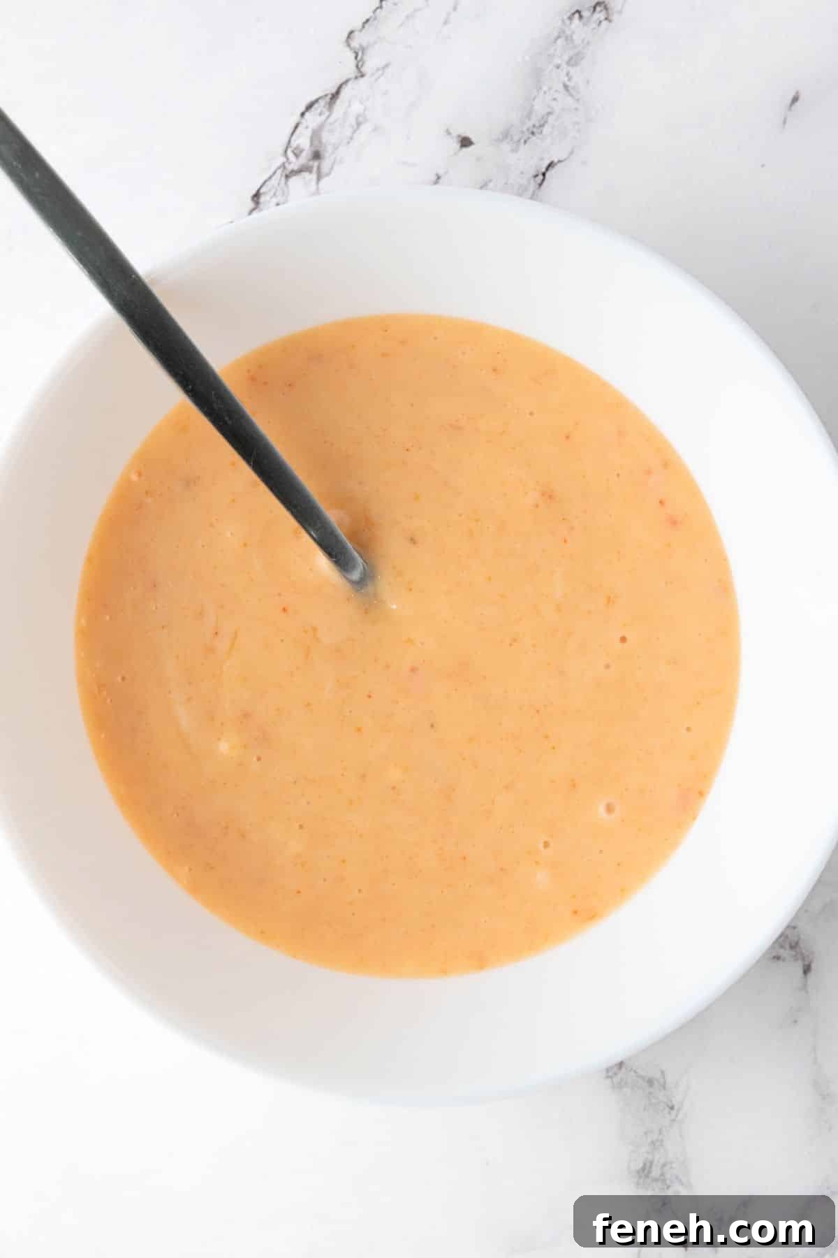 A bowl of bang bang sauce