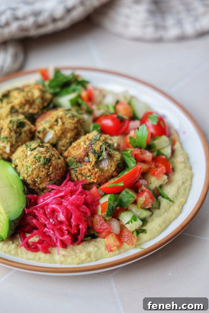 A hummus plate with cauliflower falafel.