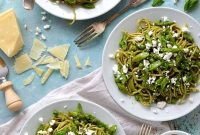 Spaghetti with Lemon Arugula & Walnut Pesto, Asparagus, Peas, Goat Cheese