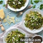 Spaghetti with lemon rocket and walnut pesto, asparagus, peas and goats cheese - quick, easy and perfect for Spring!