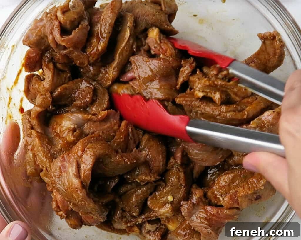 steak strips in a zesty marinade for Steak Fajitas 