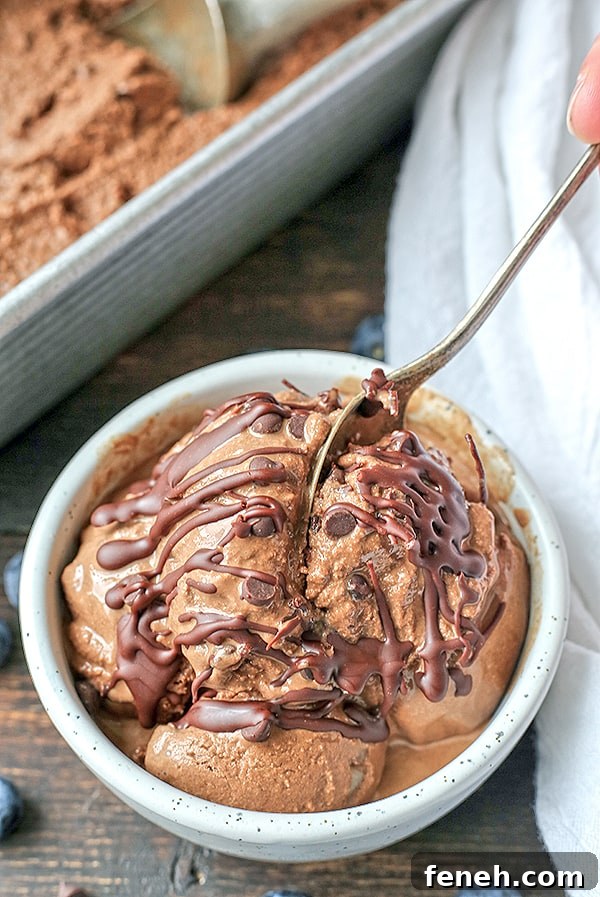 This Paleo Death By Chocolate Ice Cream is rich, creamy, and so delicious! 7 simple ingredients and a little hands on time for a treat that is so good you won't be able to tell it's healthy. Dairy free, naturally sweetened and gluten free.