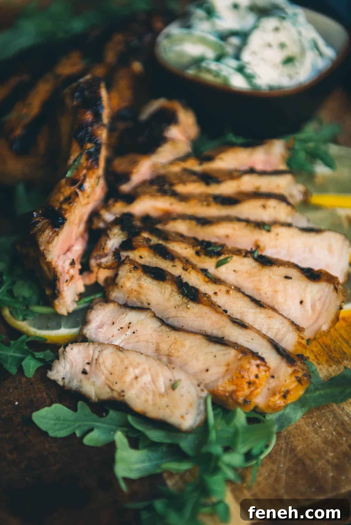 A juicy sliced grilled pork chop.