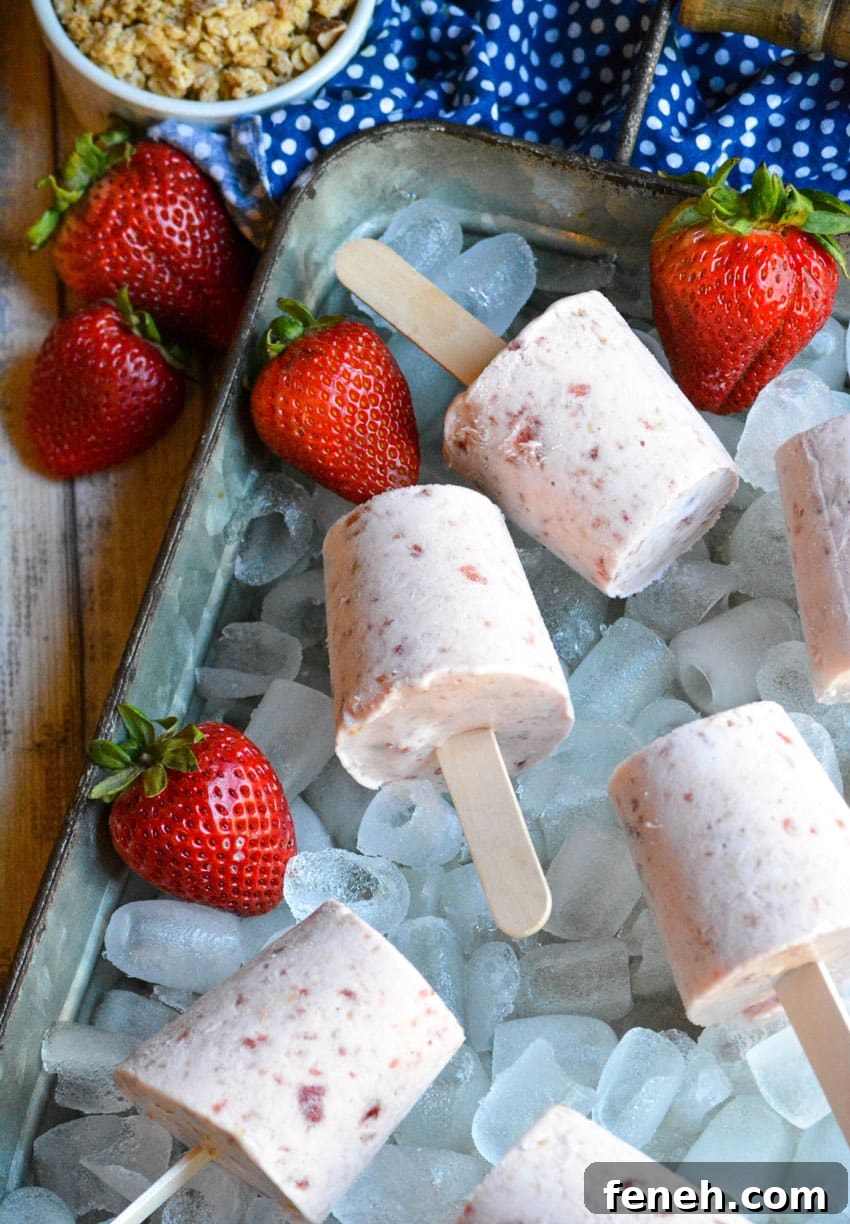 strawberry cobbler pops on a bed of ice