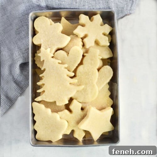 sugar cookies in metal tray.