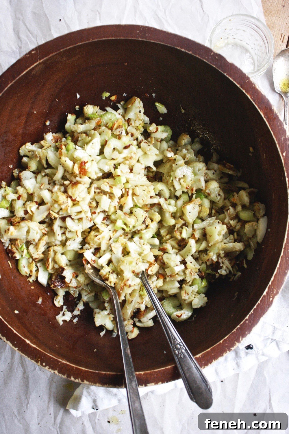 Chopped Cauliflower Salad - Tender roasted cauliflower diced up and tossed with celery, almonds, and fennel and drizzled with a delicious lemon vinaigrette! Such a hearty and delicious salad that’s perfect for fall! TheGarlicDiaries.com