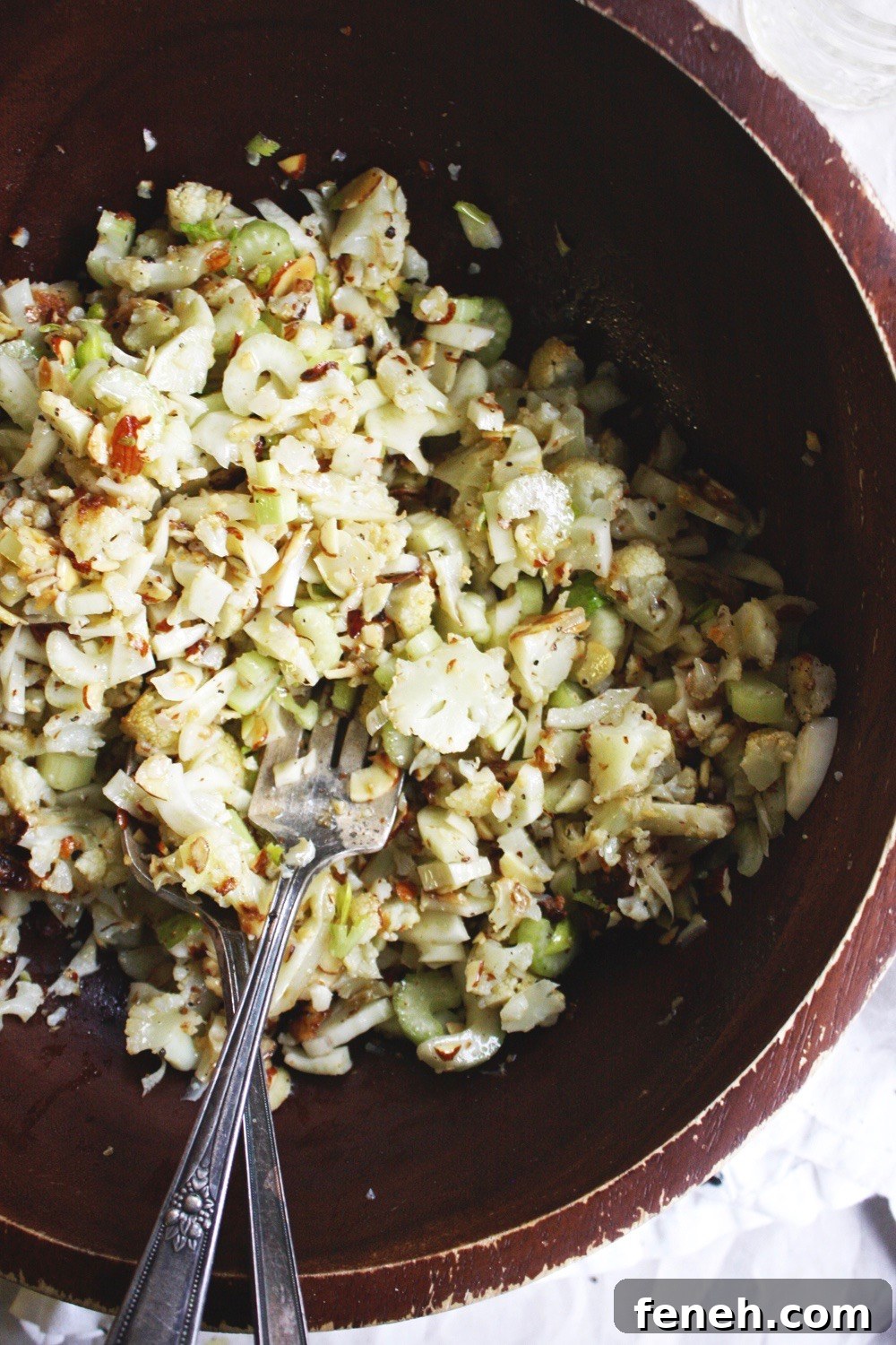 Chopped Cauliflower Salad - Tender roasted cauliflower diced up and tossed with celery, almonds, and fennel and drizzled with a delicious lemon vinaigrette! Such a hearty and delicious salad that’s perfect for fall! TheGarlicDiaries.com