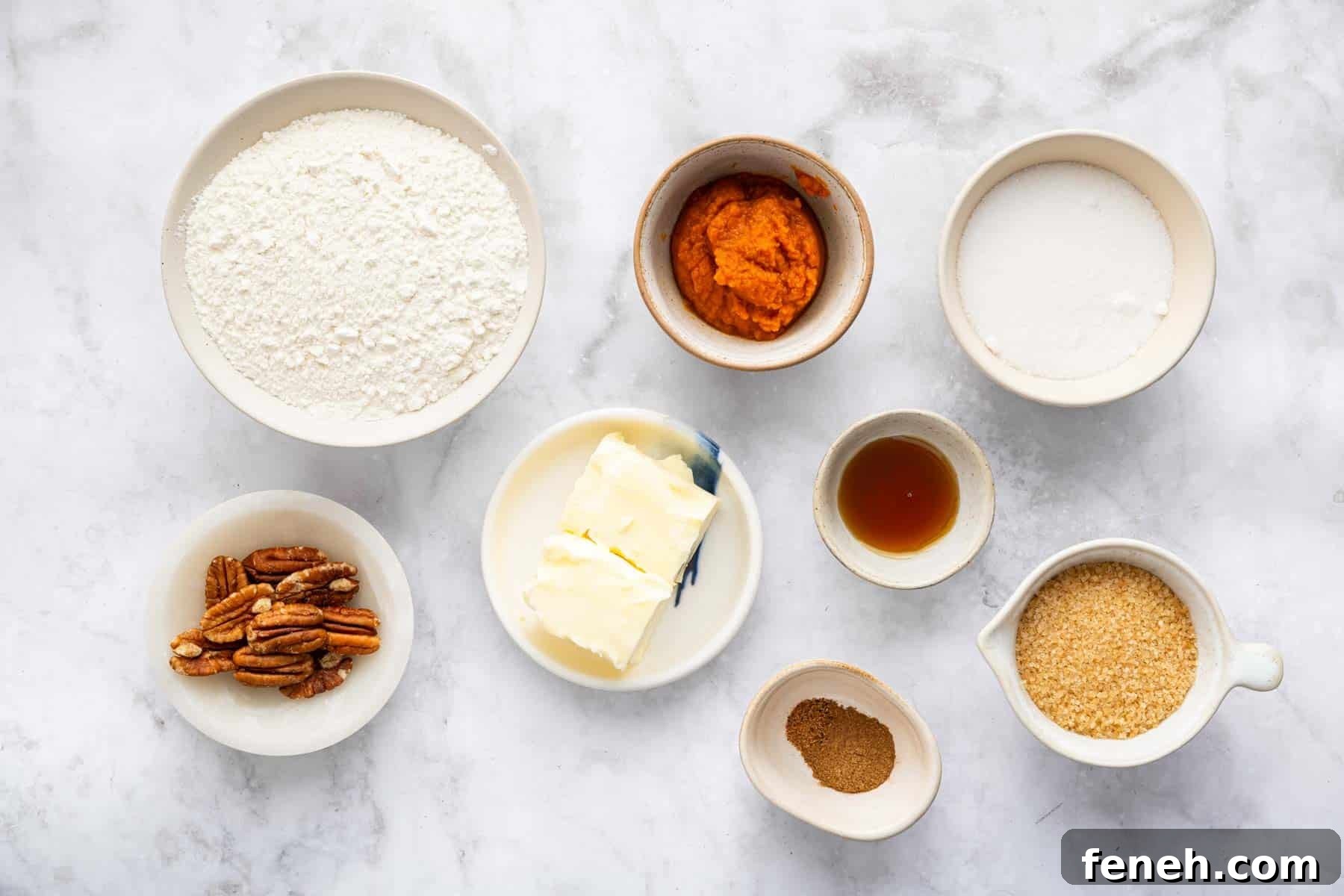 Small bowls of spices, softened butter, pecans, and sugar.