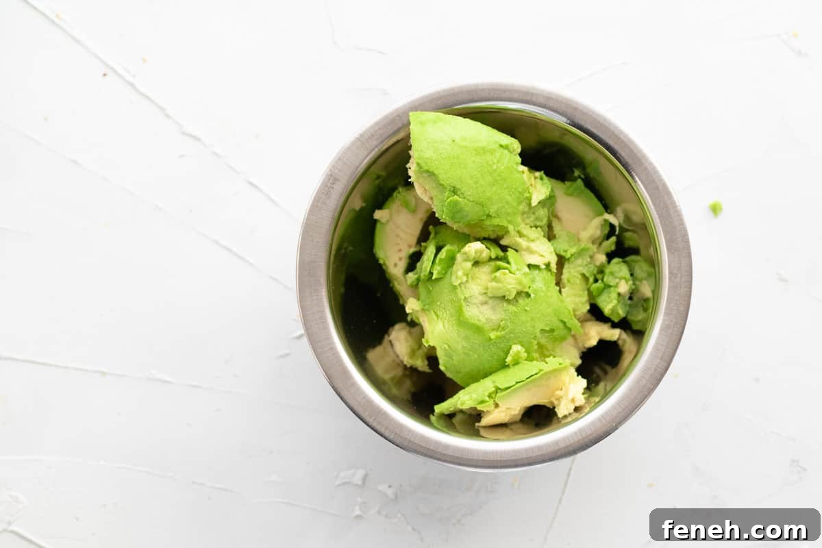 3-Ingredient Dunkin’ Style Avocado Toast Recipe 5 ripe avocado in a prep bowl