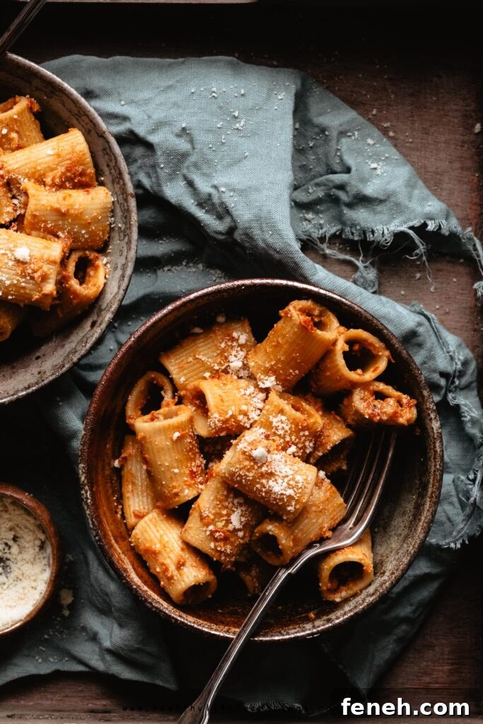 Sun dried tomato pesto pasta into a bowl