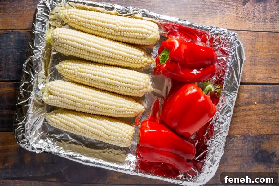 corn and red peppers on a pan