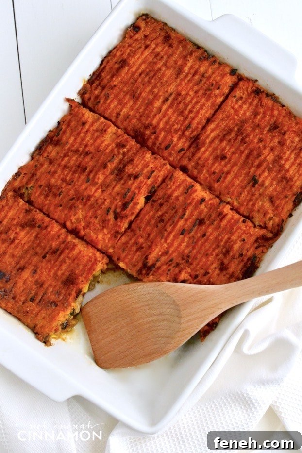 overhead shot of a white casserole dish with clean eating sweet potato shepherd's pie with ground turkey