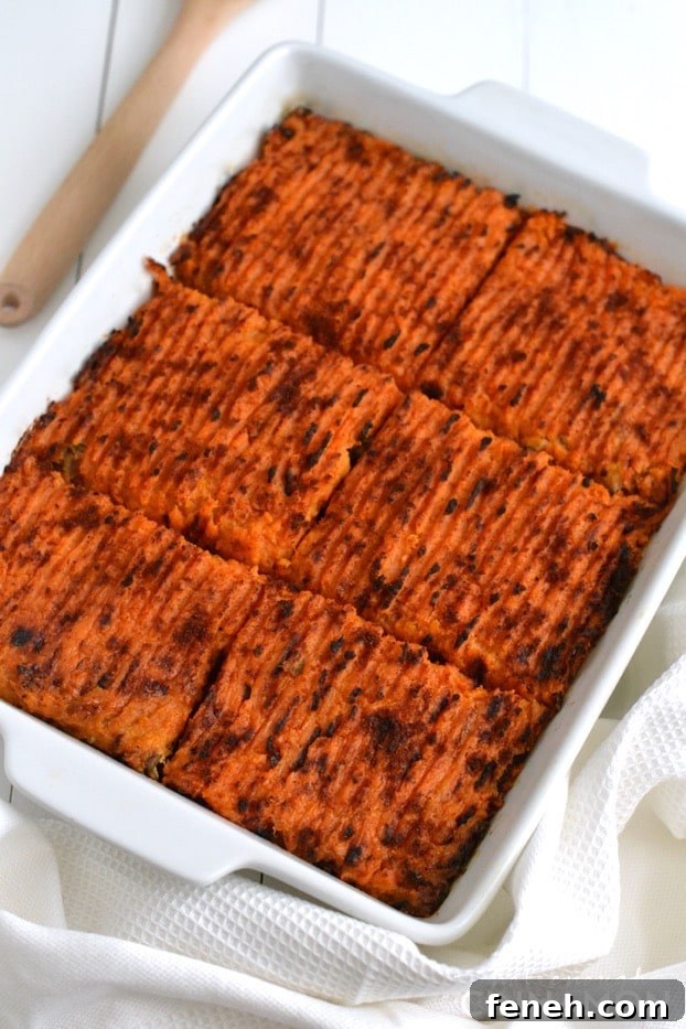 overhead view of sweet potato shepherd's pie with ground turkey served in a white casserole dish