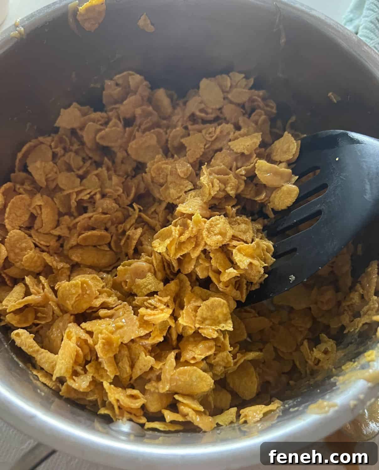 Cornflake cereal mixed with peanut butter, sugar, and corn syrup.