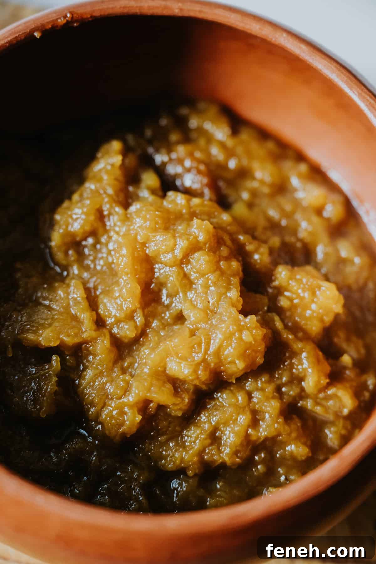 Homemade Mexican pumpkin purée with cinnamon and piloncillo in a rustic bowl.