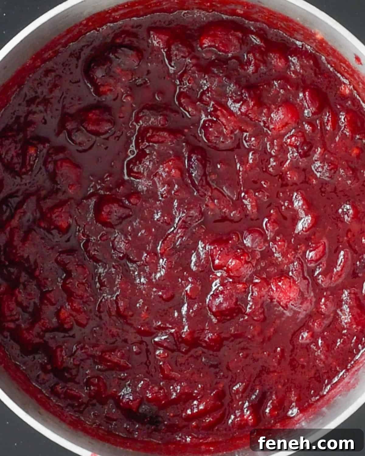 final healthy cranberry sauce mixture in a saucepan