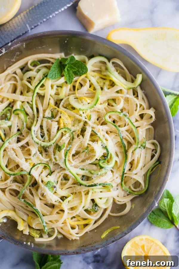 Zucchini Linguine- this easy vegetarian dinner is made with linguine and spiralized zucchini noodles for a meal that's delicious and filling for the whole family!
