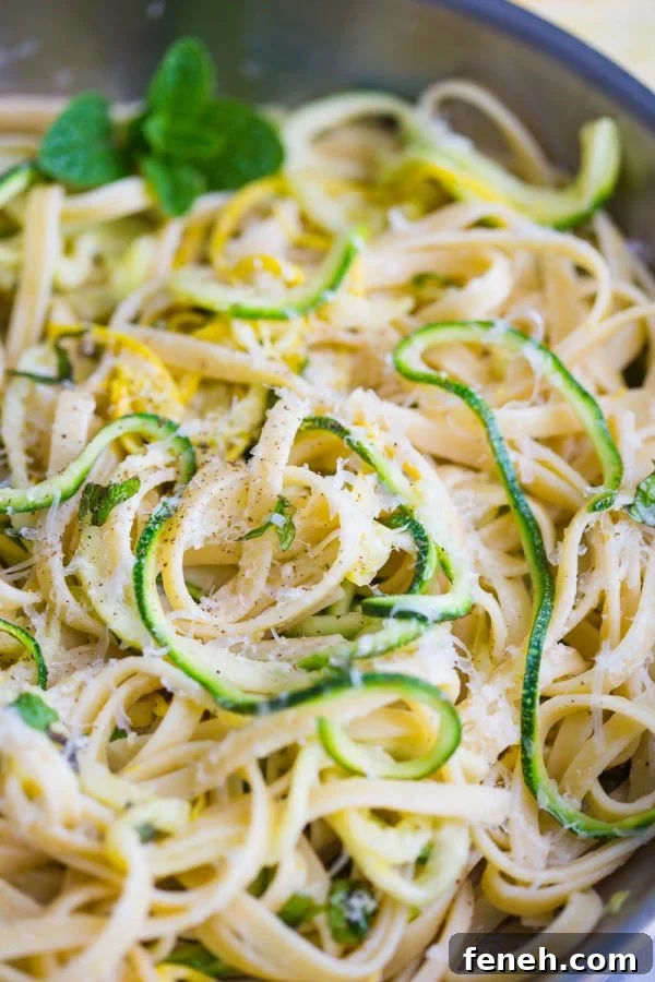 Zucchini Linguine- this easy vegetarian dinner is made with linguine and spiralized zucchini noodles for a meal that's delicious and filling for the whole family!
