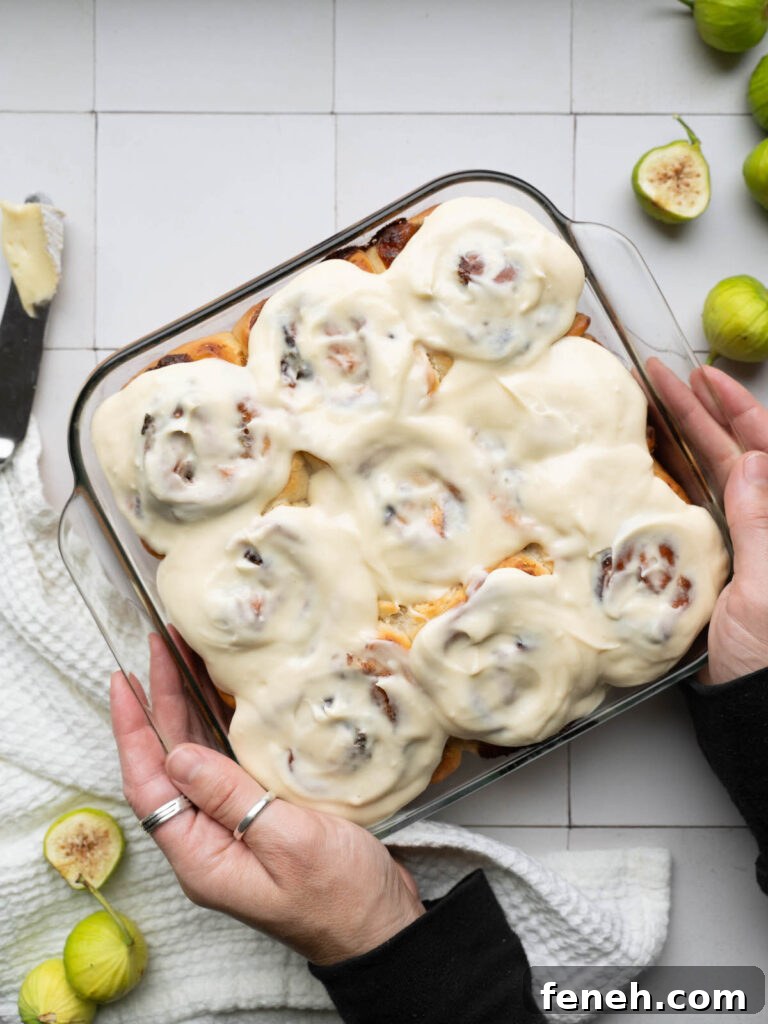 A pan of freshly frosted homemade cinnamon rolls