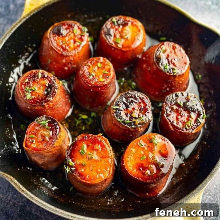 Fondant sweet potatoes in a cast iron skillet.
