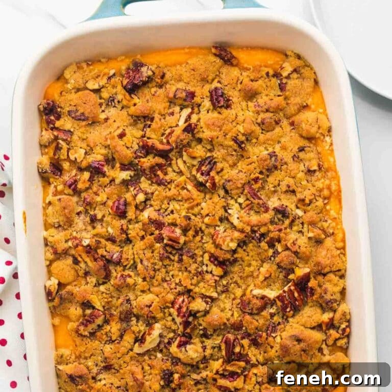 Sweet potato casserole with crunchy pecan topping.