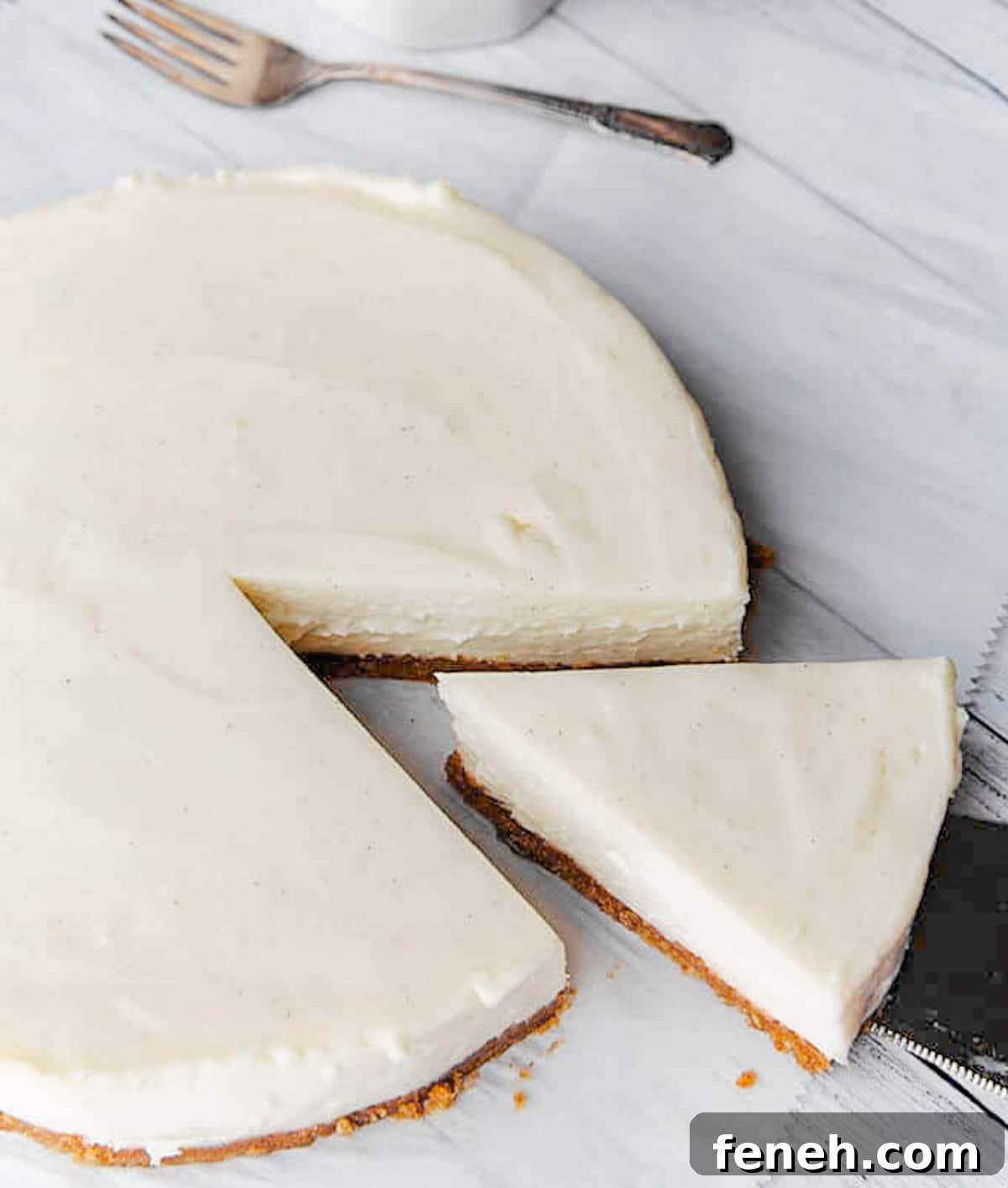 Cheesecake cooling on the counter.