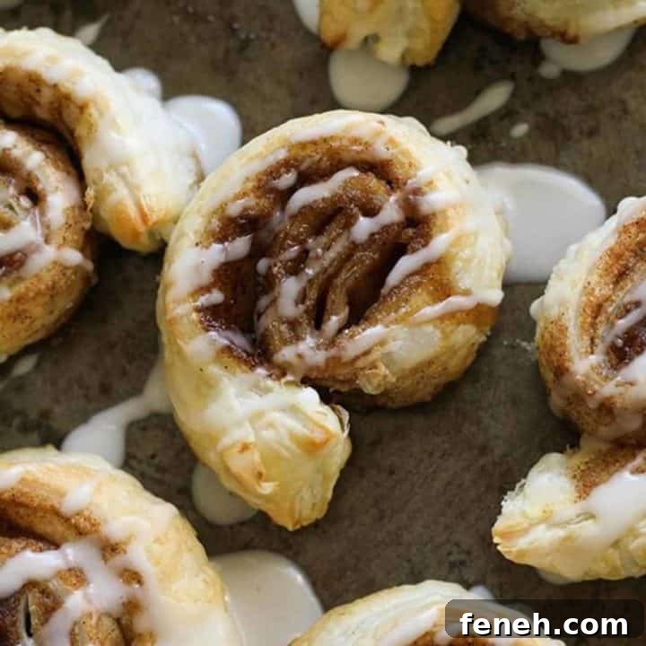 cinnamon rolls on a baking tray.