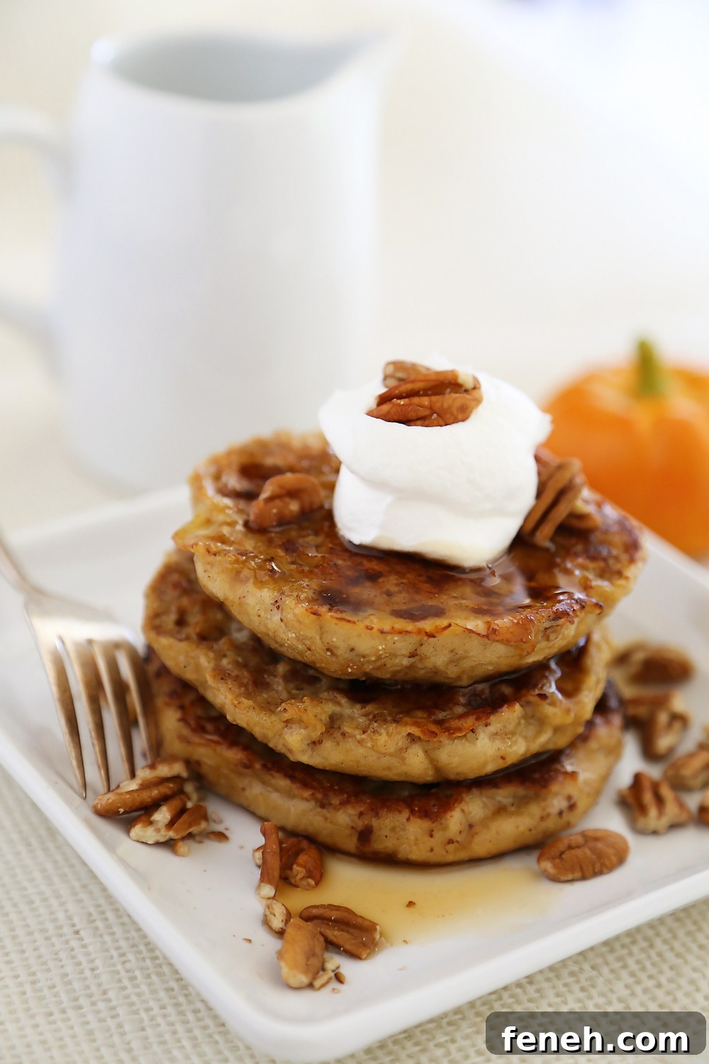 Pumpkin Vanilla English Muffin French Toast - Fluffy, buttery French toast made with pumpkin spice English muffins, vanilla, cinnamon and nutmeg!
