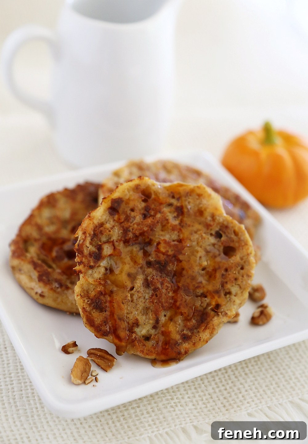 Pumpkin Vanilla English Muffin French Toast - Fluffy, buttery French toast made with pumpkin spice English muffins, vanilla, cinnamon and nutmeg!