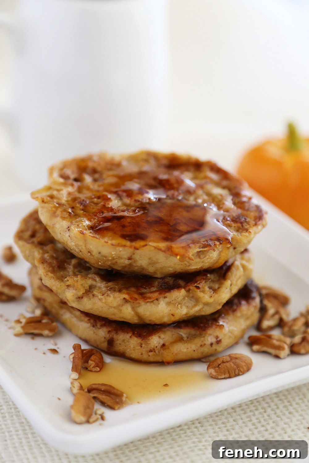 Pumpkin Vanilla English Muffin French Toast - Fluffy, buttery French toast made with pumpkin spice English muffins, vanilla, cinnamon and nutmeg!