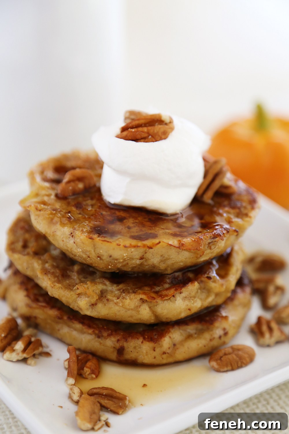 Pumpkin Vanilla English Muffin French Toast - Fluffy, buttery French toast made with pumpkin spice English muffins, vanilla, cinnamon and nutmeg!