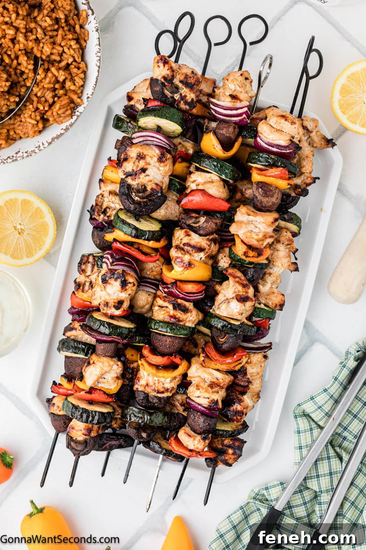 grilled chicken kebabs on a serving platter