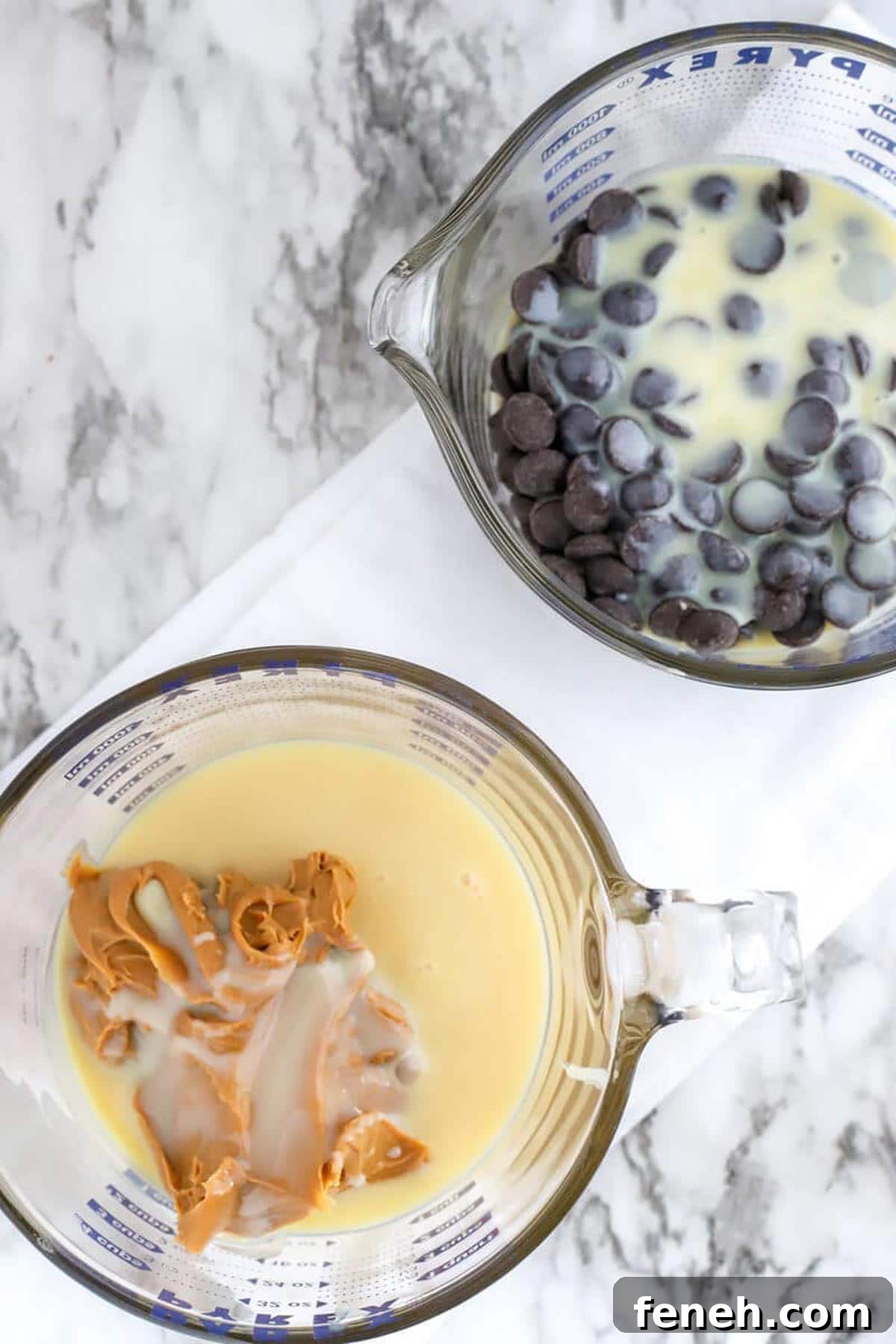 2 measuring cups containing peanut butter and sweetened condensed milk and chocolate chips with sweetened condensed milk.