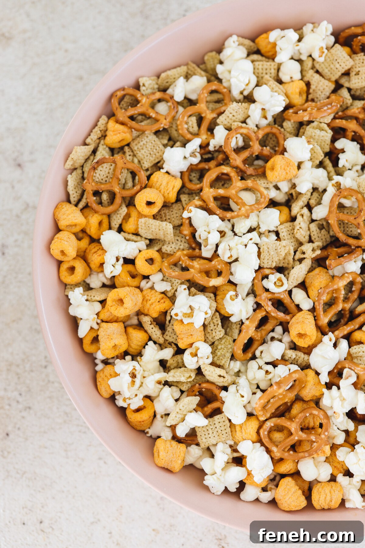 gluten-free chex mix in a pink bowl