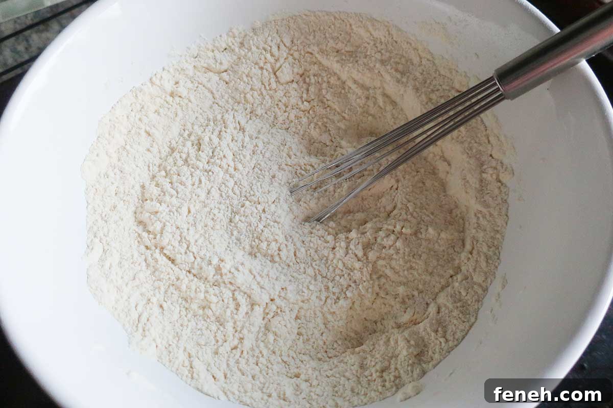 flour mixture in a bowl with a whisk