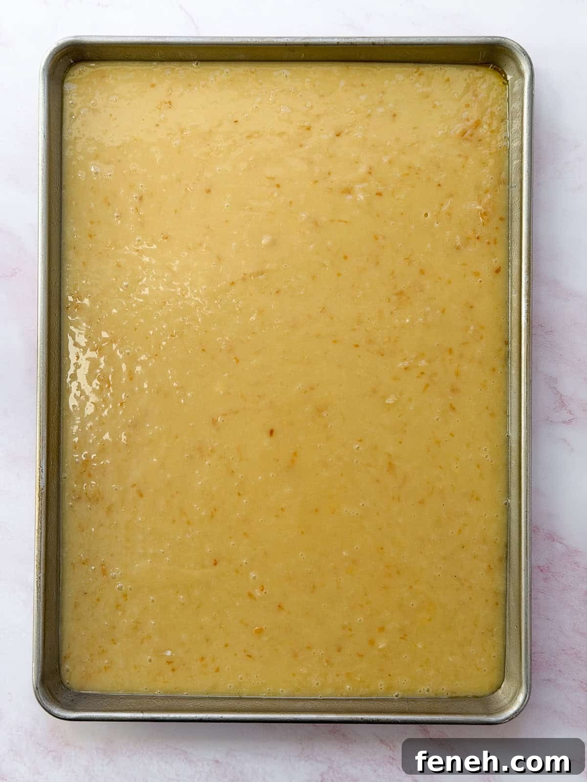 cake batter in the pan ready to bake.