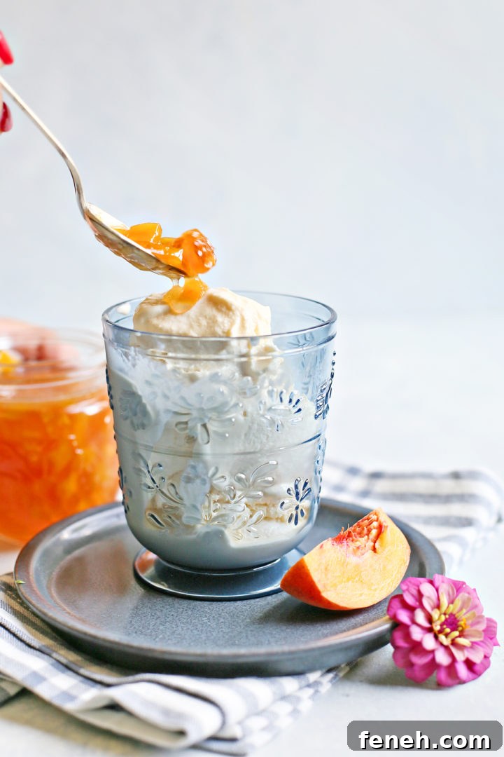 Peach syrup over ice cream