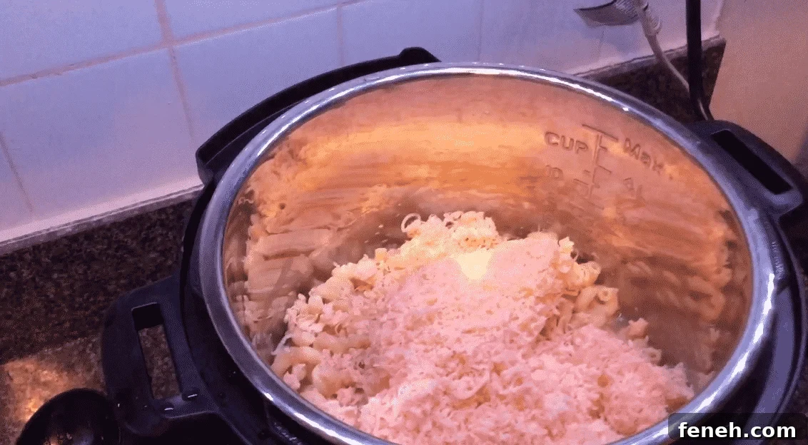 Melting cheese into macaroni