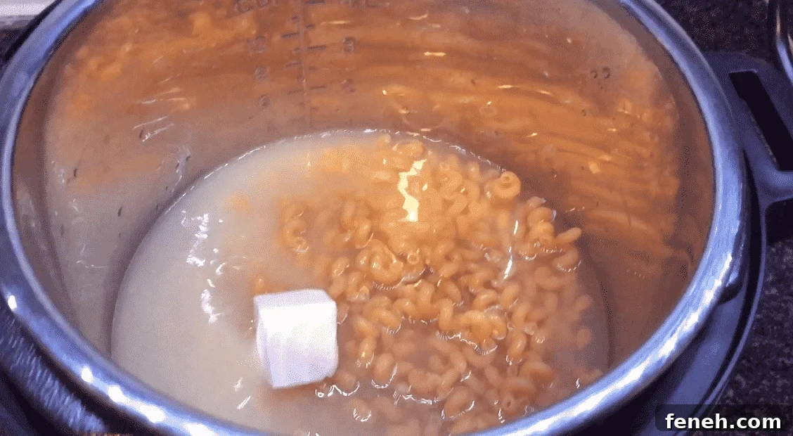 Adding butter to macaroni and cheese