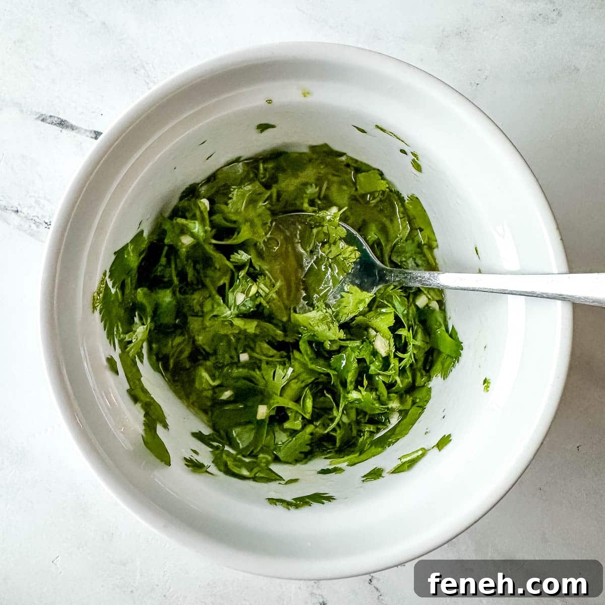 Cilantro lime marinade in a white dish.