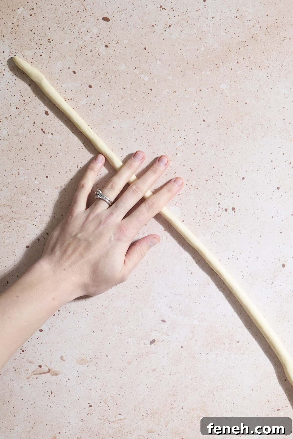 Dough rolled into a long rope.