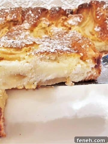 Slice of fresh pear cream slice cake.
