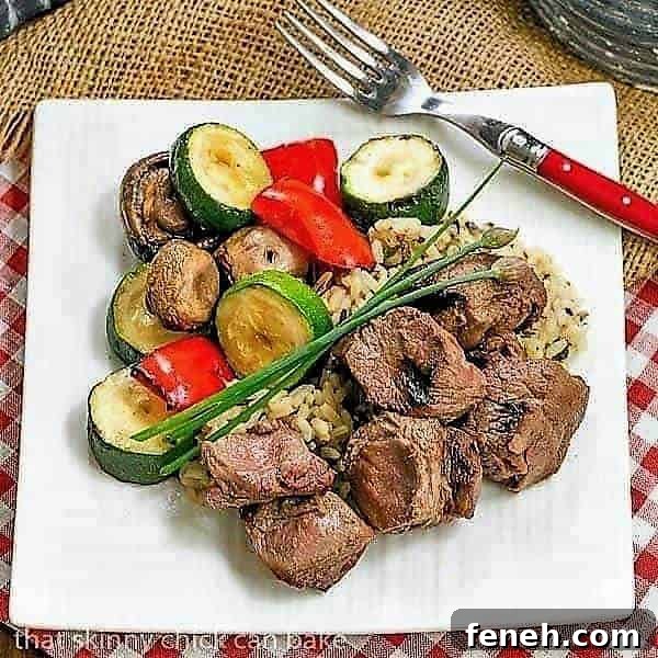 Beef Teriyaki Kabobs on a square white plate.